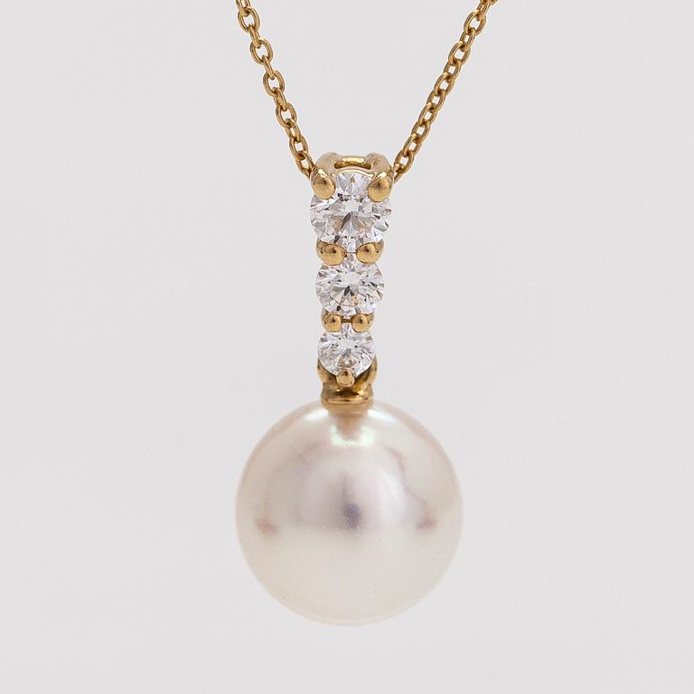 An 18K gold necklace with a cultured pearl pendant and diamonds totalling approx. 0.15 ct.