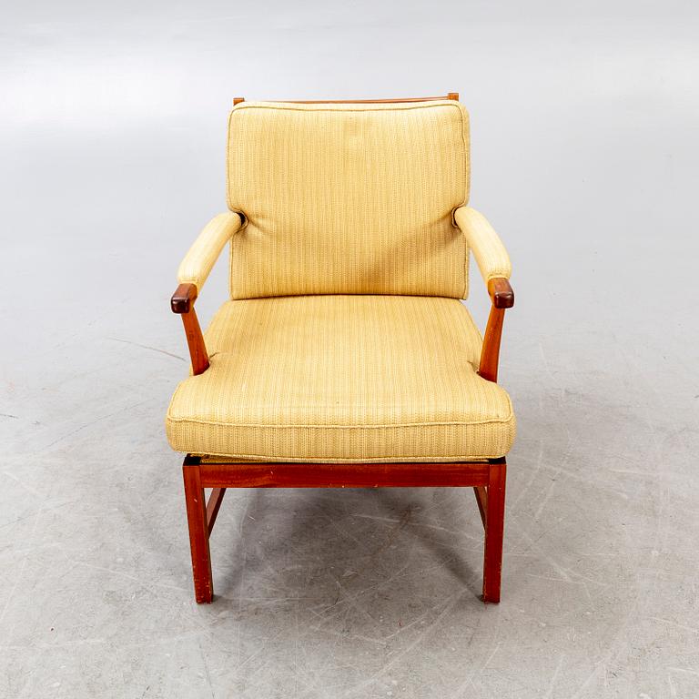 A Josef Frank walnut armchair Firma Svenskt Tenn model nr 667.