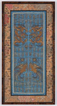 A silk emboridery of dragons, phoenix and shou characters, Qing dynasty, 19th century.