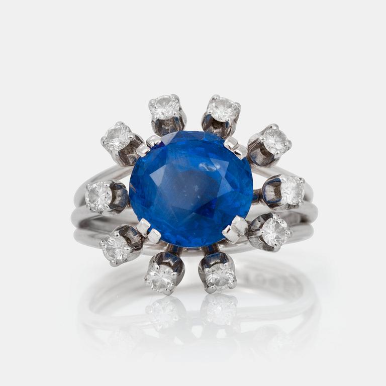 A sapphire and brilliant-cut diamond ring.