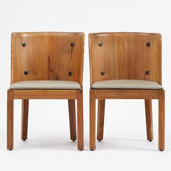 Axel Einar Hjorth, a pair of stained pine "Lovö" armchairs, Nordiska Kompaniet, Sweden, 1930s.