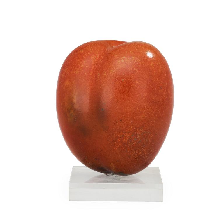 A Hans Hedberg faience sculpture of a plum, Biot, France.