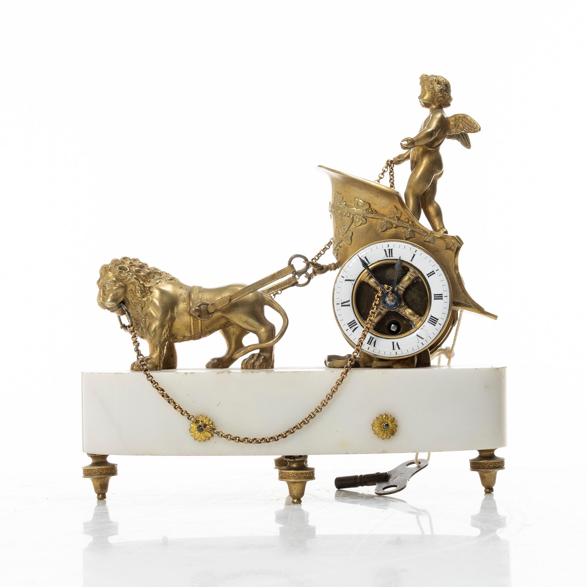 An Empire table clock, likely Northern Europe, early 19th century.