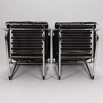 YRJÖ KUKKAPURO, A pair of late 1900s open armchairs, "Remmi" Avarte.