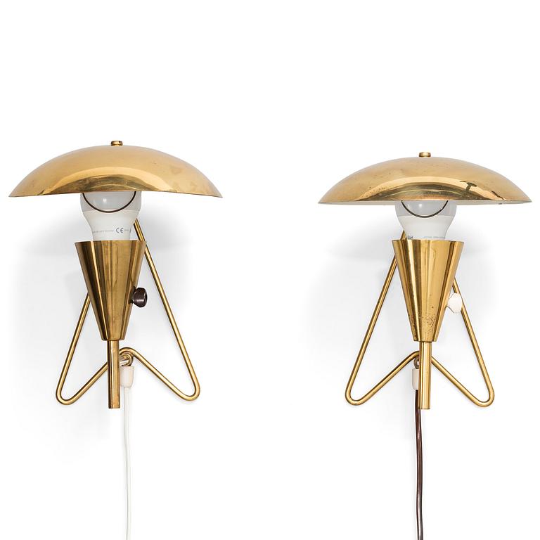 A pair of mid-20th-century wall lights / table lamps, model EV 57 for Itsu, Finland.