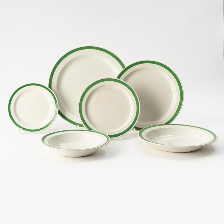 Wilhelm Kåge, a 106 pieces creamware 'Praktika/ Weekend' service, Gustavsberg, Sweden 1930s.