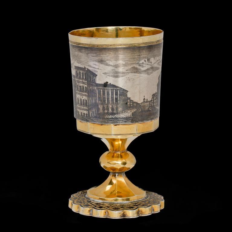 A Russian silver-gilt and niello vodka-cup, makers mark probably of Ivan Sujew, Wologda 1840's.
