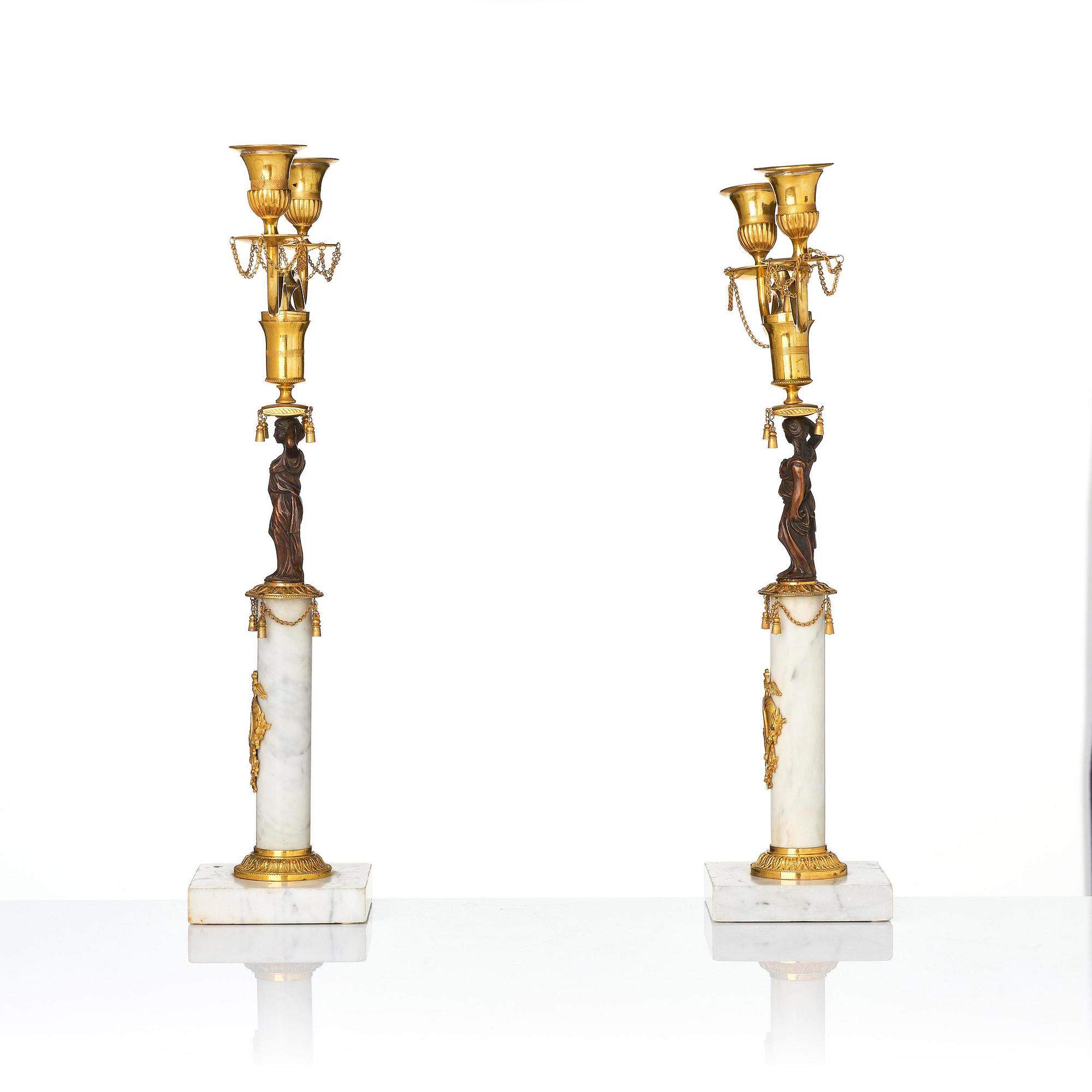 A pair of late Gustavian two-branch candelabra in the manner of F. L. Rung, Stockholm, circa 1800.