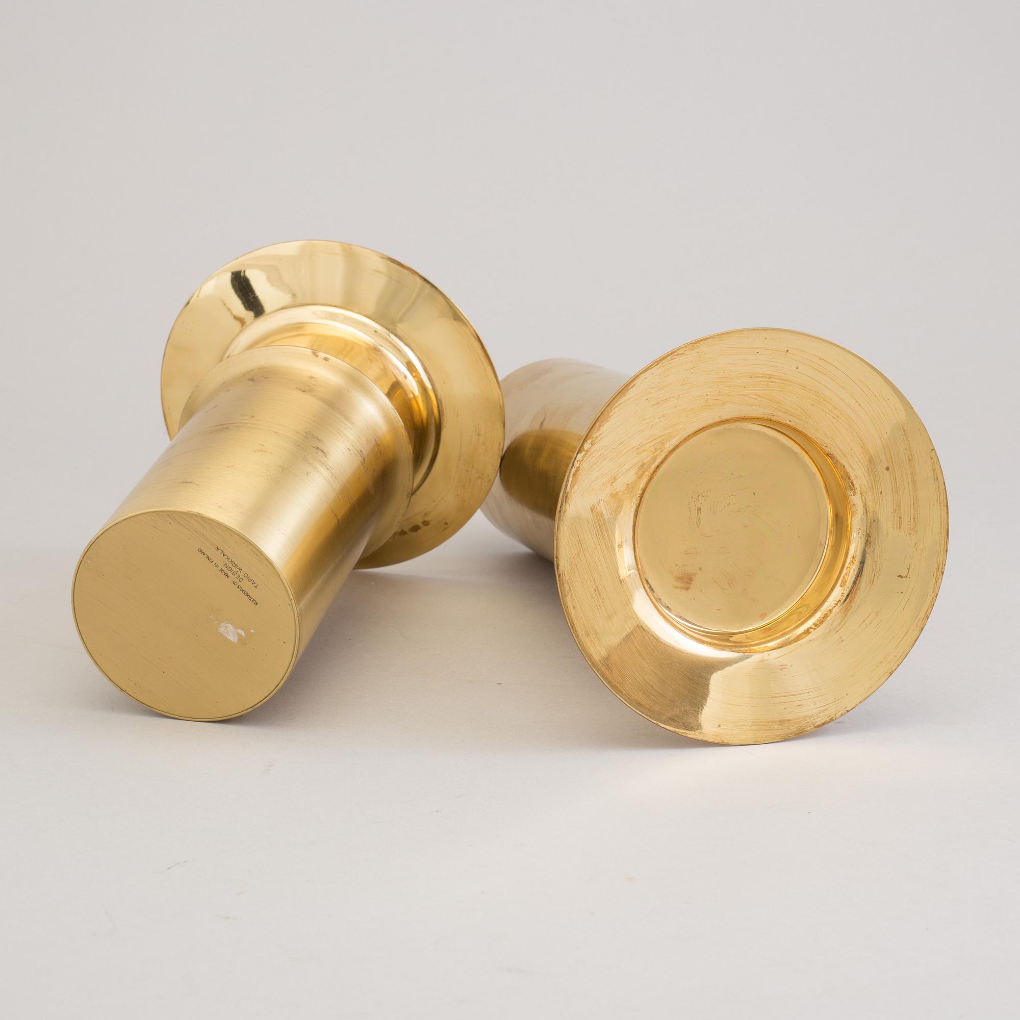 TAPIO WIRKKALA, a pair of brass candlesticks from Kultakeskus Oy, Finland.
