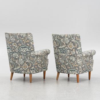 Carl Malmsten, a pair of Hemmakväll easy chairs .