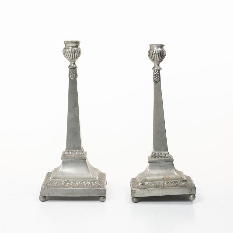 A pair of peuter candlesticks by Petter Höijer, Örebro (1796-1819).