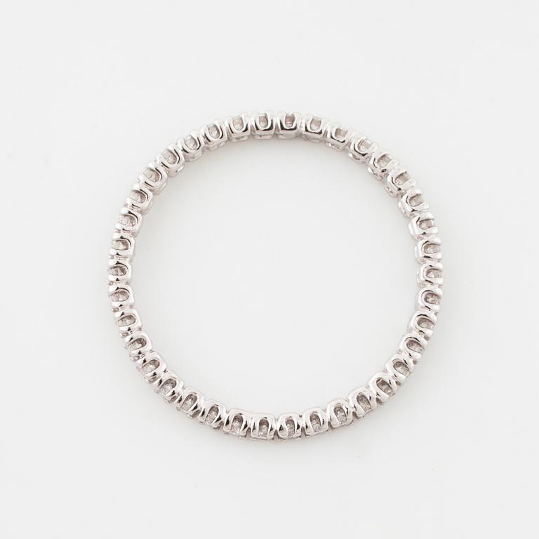 A brilliant cut diamond ring.