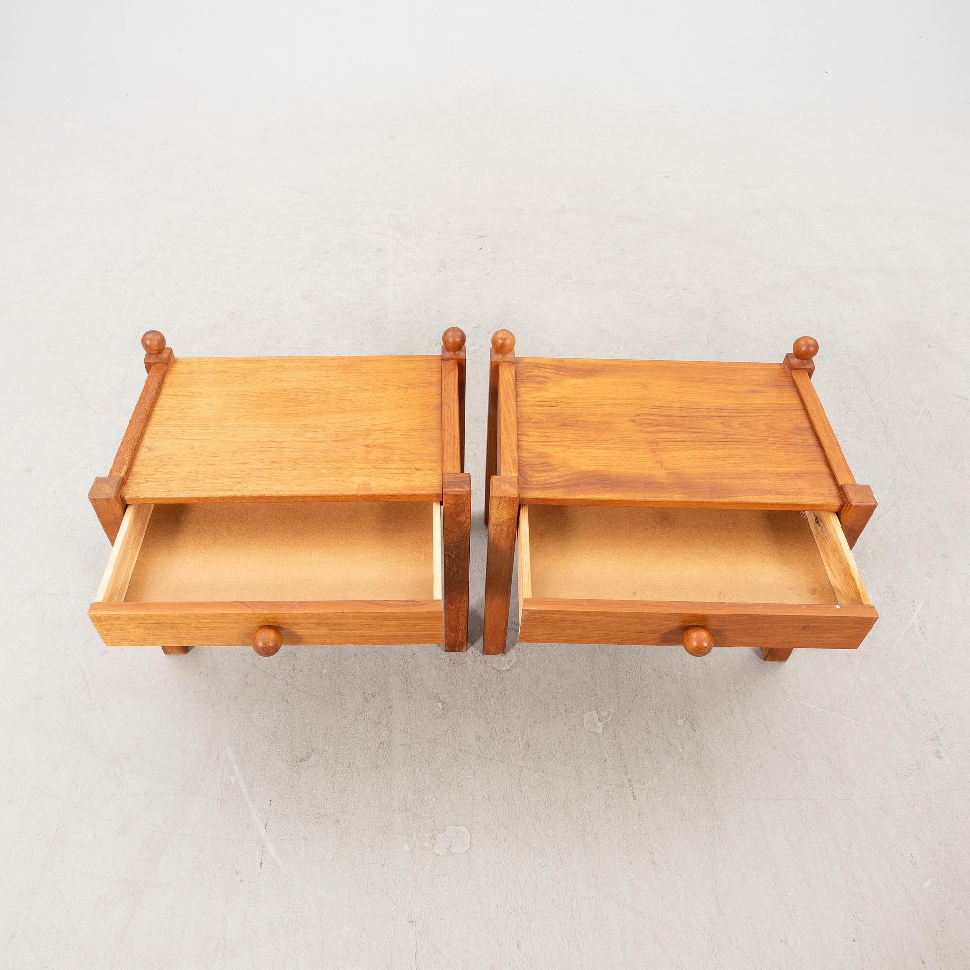 A pair of 1960s walnut bedside tables.