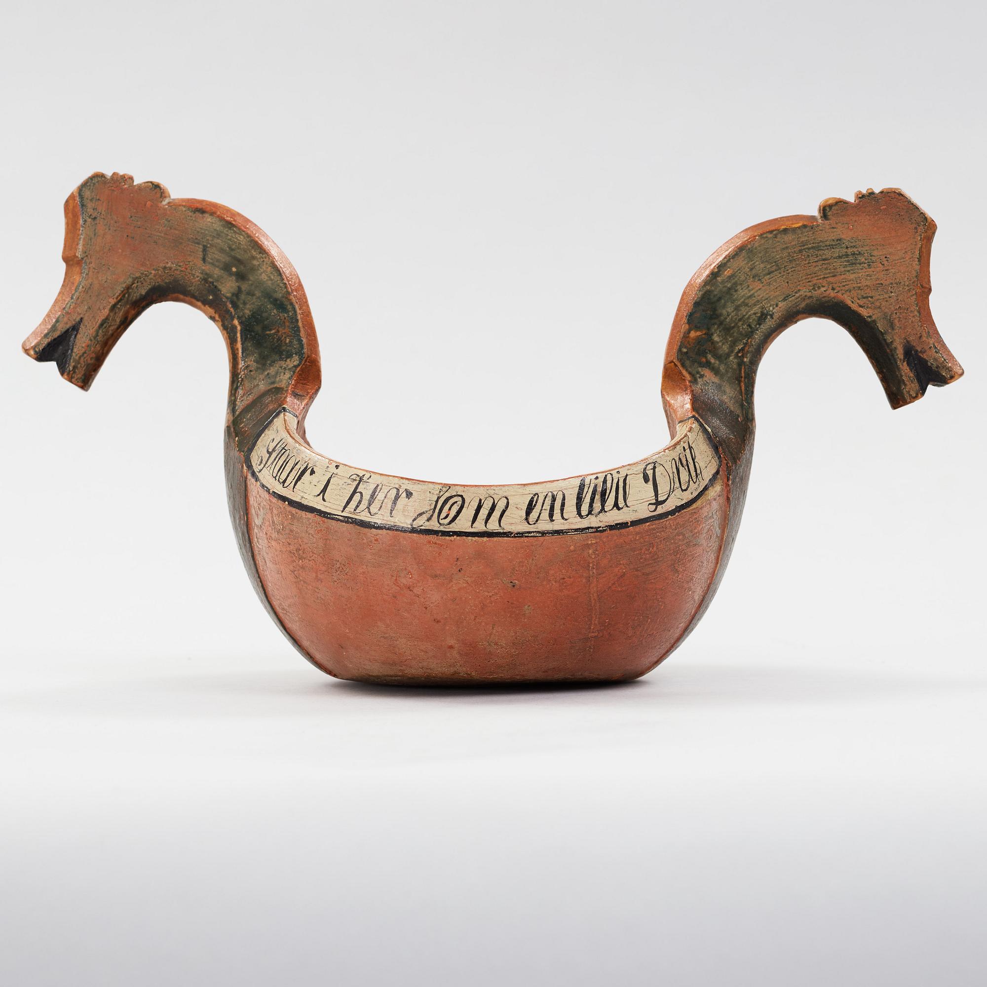 A Norwegian 18th century "Kjenge" painted carved wood ale cup bowl.