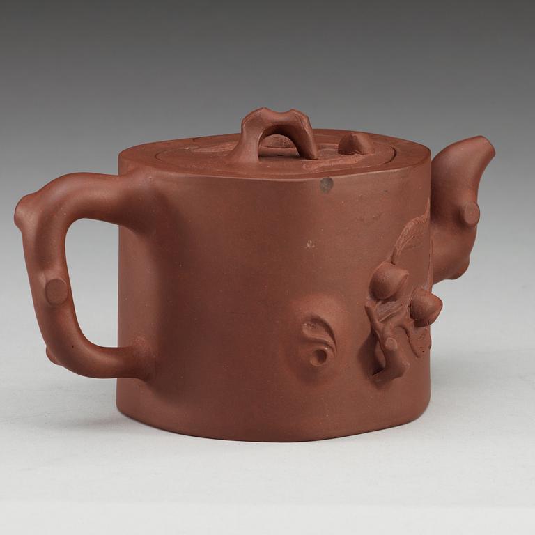 A Chinese Yixing tea pot with cover, 20th Century.