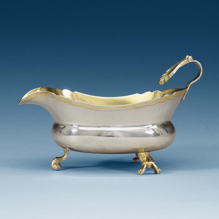 A Swedish 18th century parcel-gilt cream-jug, makers mark of Johan Runqvist, Karlskrona 1770.