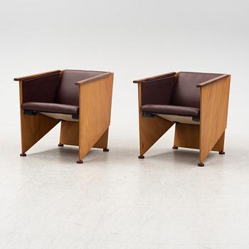 Torbjörn Ahlström, a pair of mahogany and cherry armchairs.