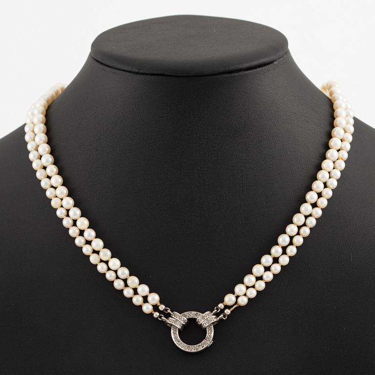 Pearl necklace, double-stranded, cultured pearls, clasp in white gold set with rose-cut diamonds.