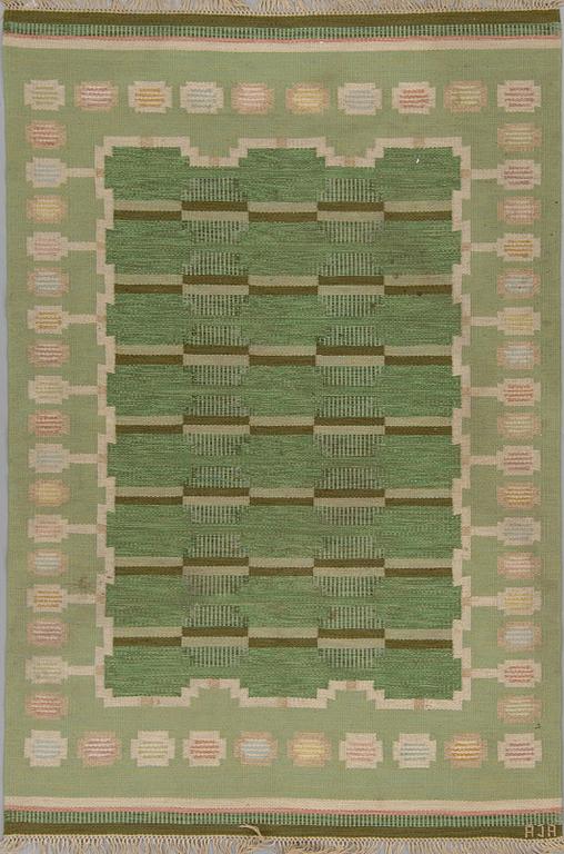 A CARPET, flat weave, ca 247 x 167,5 cm, signed AJA.