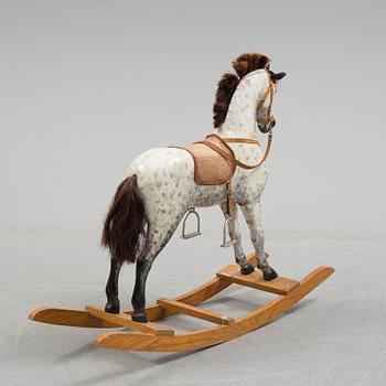 A circa 1900 rocking horse.