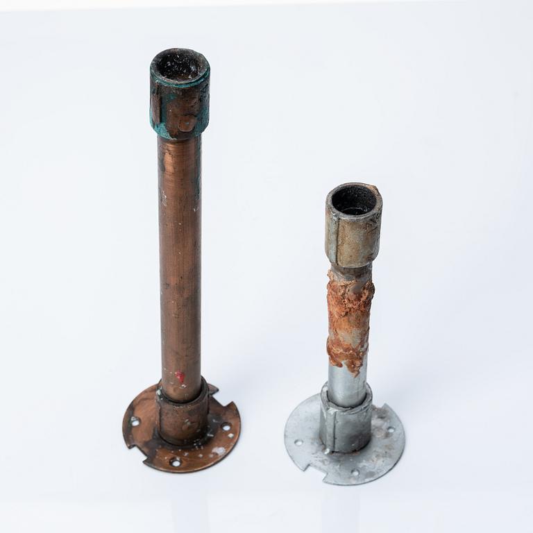 Two 20th century industrial design metal/copper pipe candlesticks.