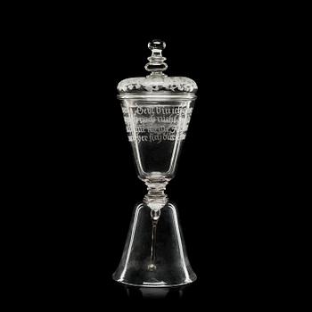 689. An engraved glass goblet with cover/table bell, 18th Century.