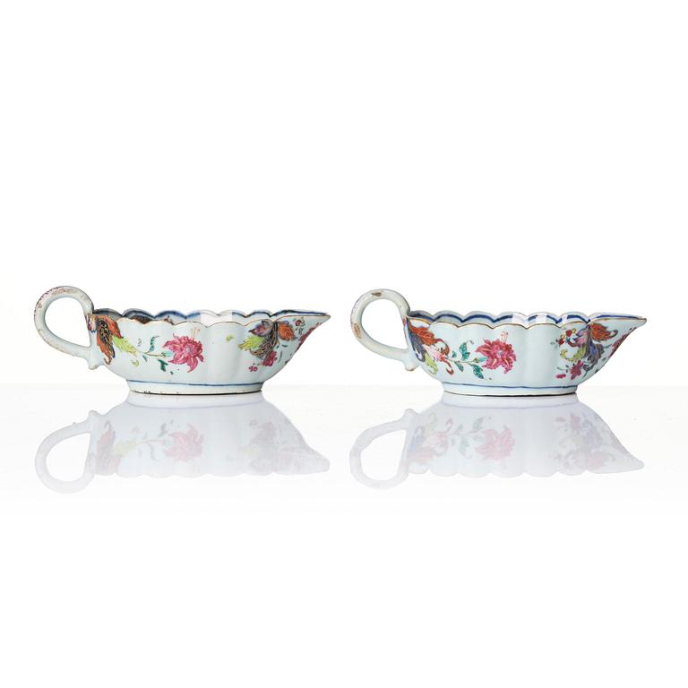 A pair of famille rose pseudo tobacco leaf sauce boats, Qing dynasty, Qianlong (1736-95).