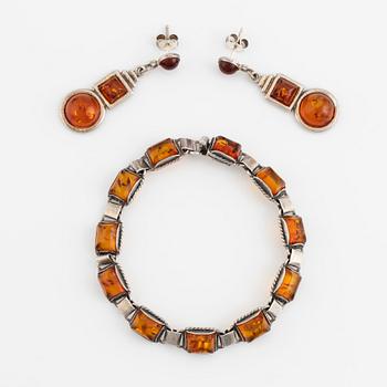 Silver and amber bracelet and earrings.