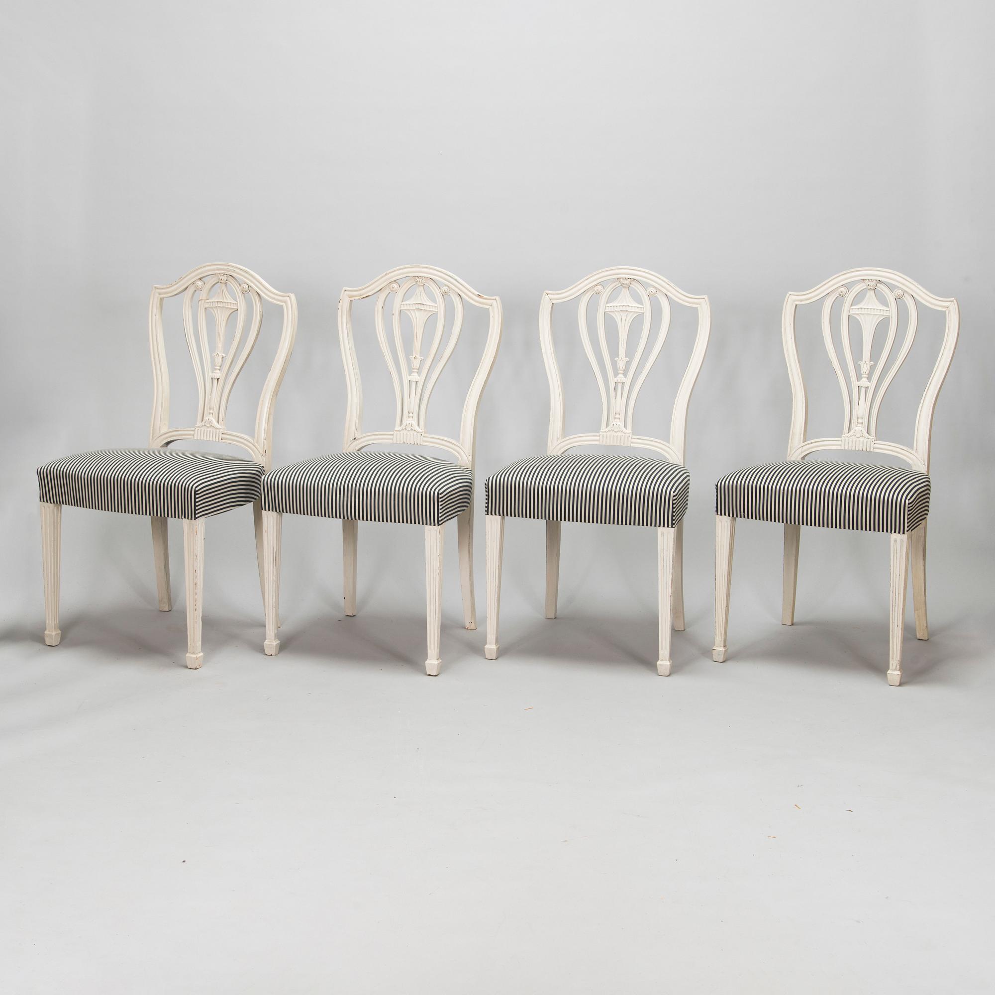 Four George III style chairs, early 20th century.