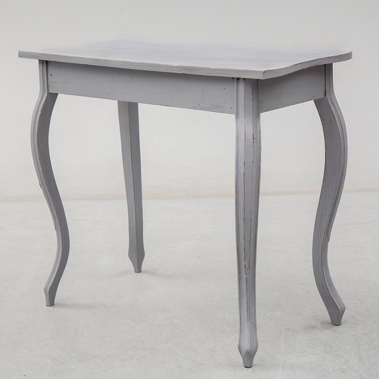 A circa 1900 Rococo style writing desk.