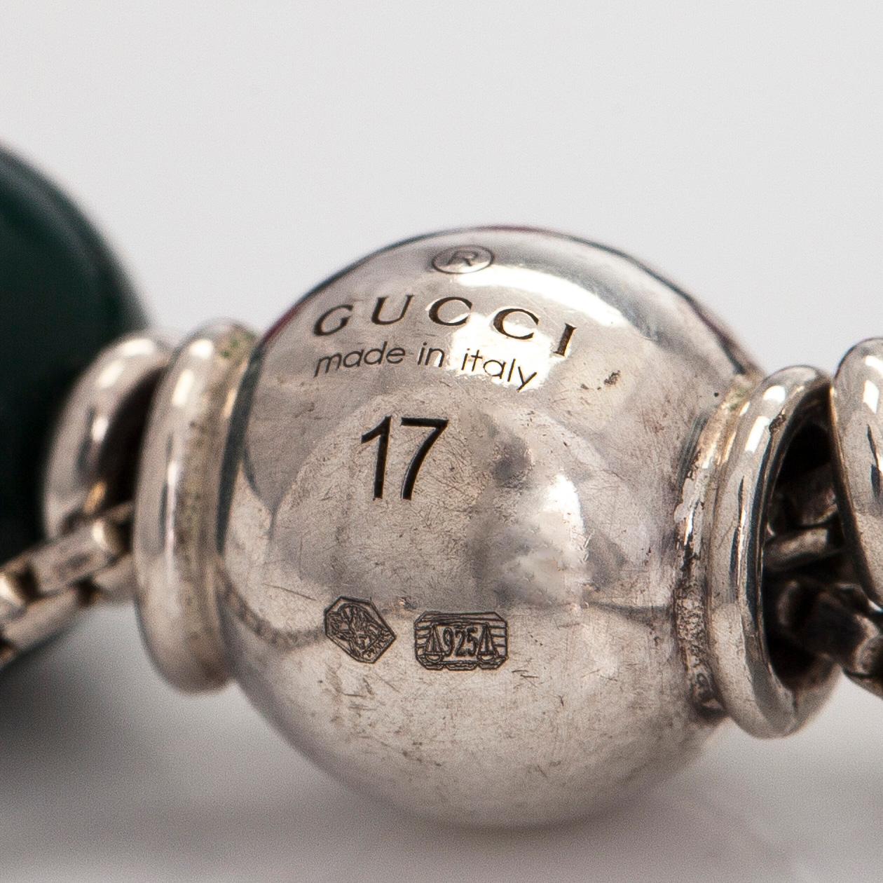 Gucci, a 'Boule Britt"' bracelet.