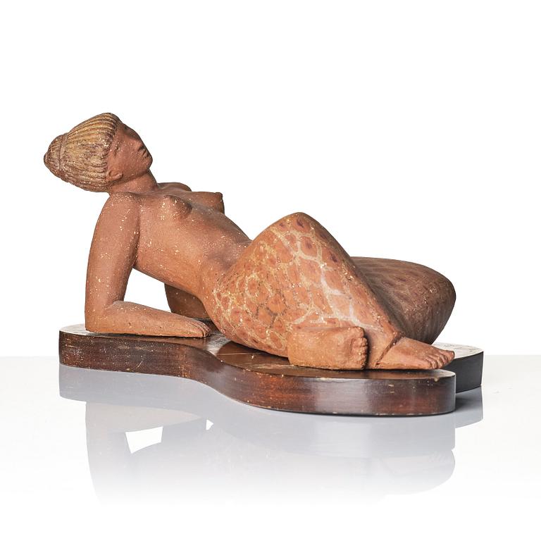 Stig Lindberg, a chamotte stoneware sculpture of a reclining woman, Gustavsberg studio, Sweden mid-20th century.