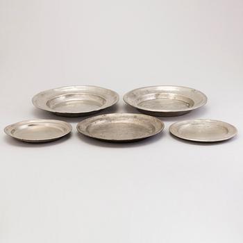 Five pewter dishes, 19th Century.