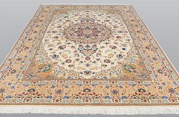 A carpet, Tabriz, ca 385 x 247 cm.