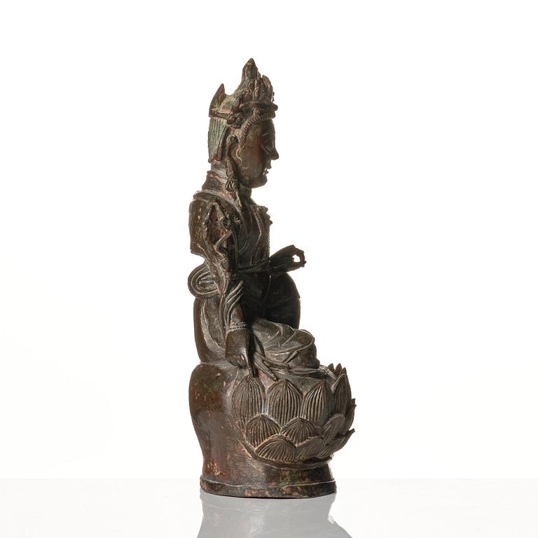 A bronze figure of Guanyin, late Ming dynasty (1368-1644).