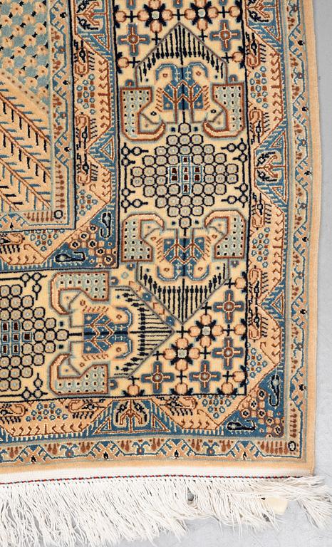 A rug, Old Nain, part silk, ca 257 x 165 cm.