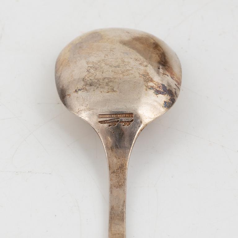 Skålar, bägare, bestick, gräddkanna samt ljusstake, 11 delar, silver. Bl a K Anderson, Stockholm 1923.