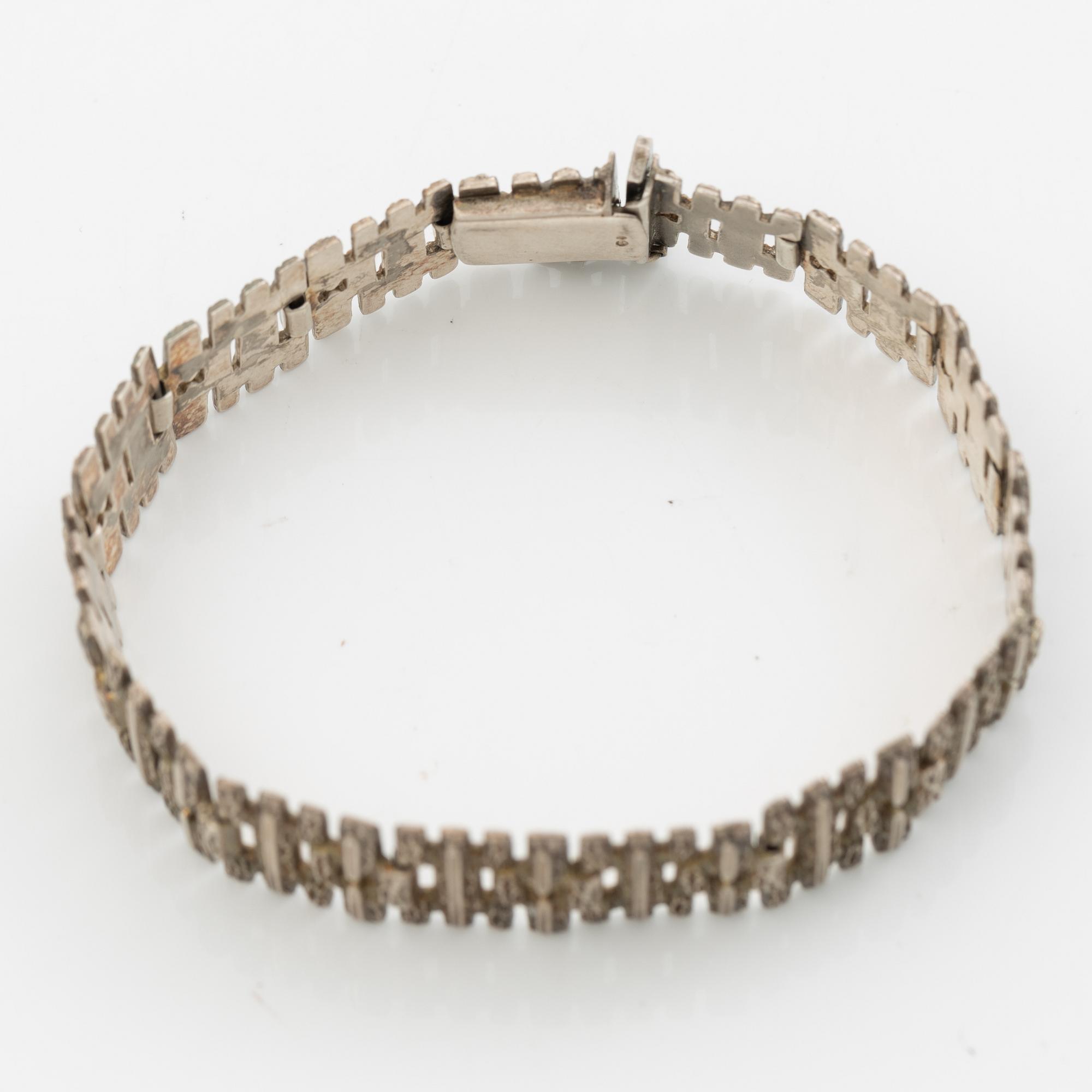 Silver bracelet.