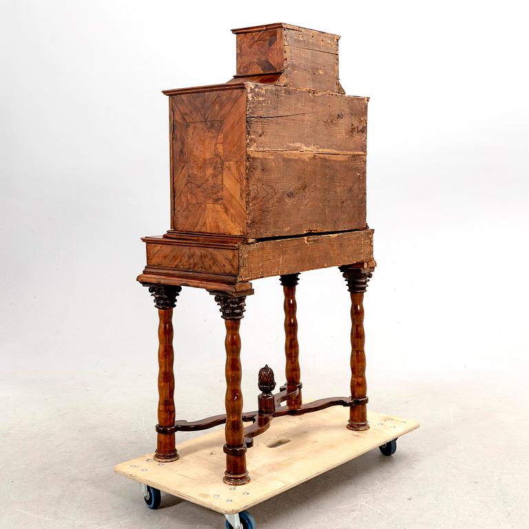 A first half of the 18th century walnut cabinet.