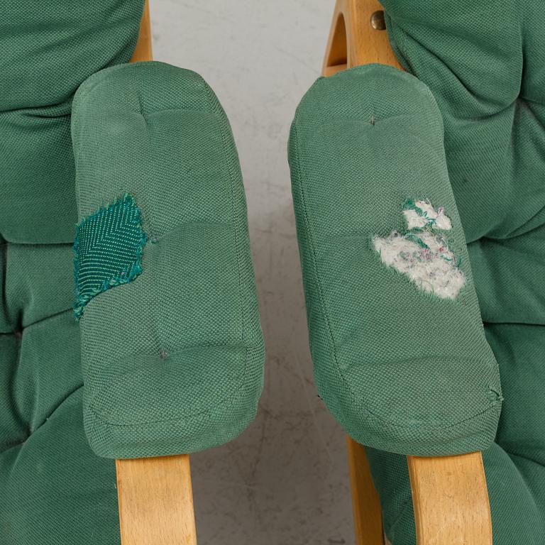 Bruno Mathsson, a pair of "Ingrid" armchairs, Dux, Sweden, second half of the 20th century.