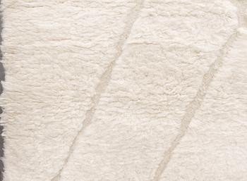 A Moroccan carpet, c 340 x 276 cm.