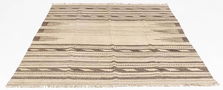 A persian kilim, ca 300 x 200 cm.