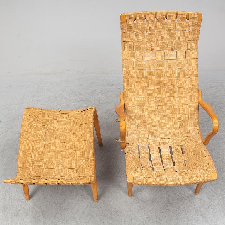 An mid 20th Century easy chair  and stool by Bruno Mathsson for Karl Mathsson Värnamo.
