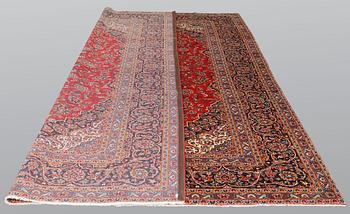 A carpet, Kashan signed, ca 385 x 293 cm.