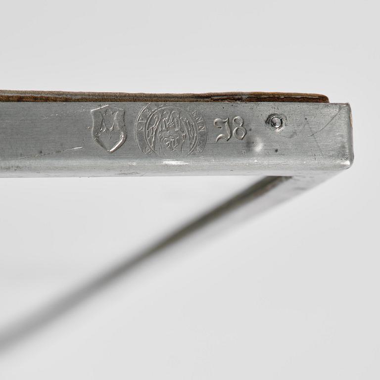 Firma Svenskt Tenn, a pewter wall mirror, Stockholm, 1935.