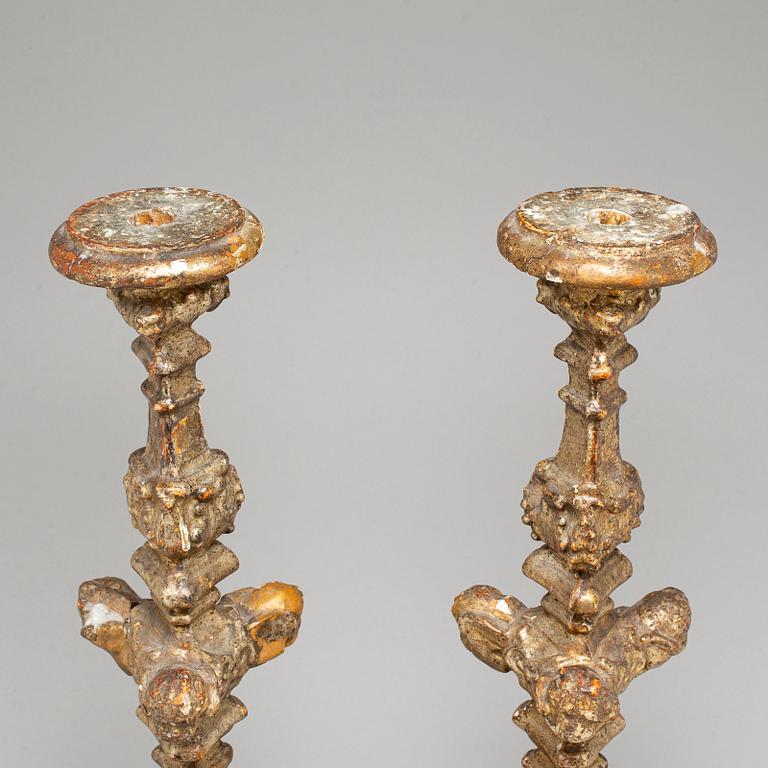 A pair of 18th century candlesticks.