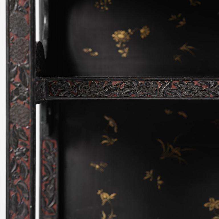 A lacquer display cabinet, late 19th century.