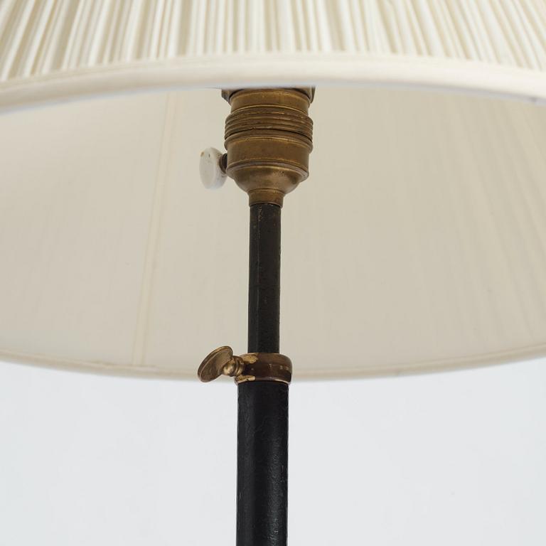 Josef Frank, a nr 2326 brass and black lacquered floor light, Svenskt Tenn, Sweden 1930-40's.