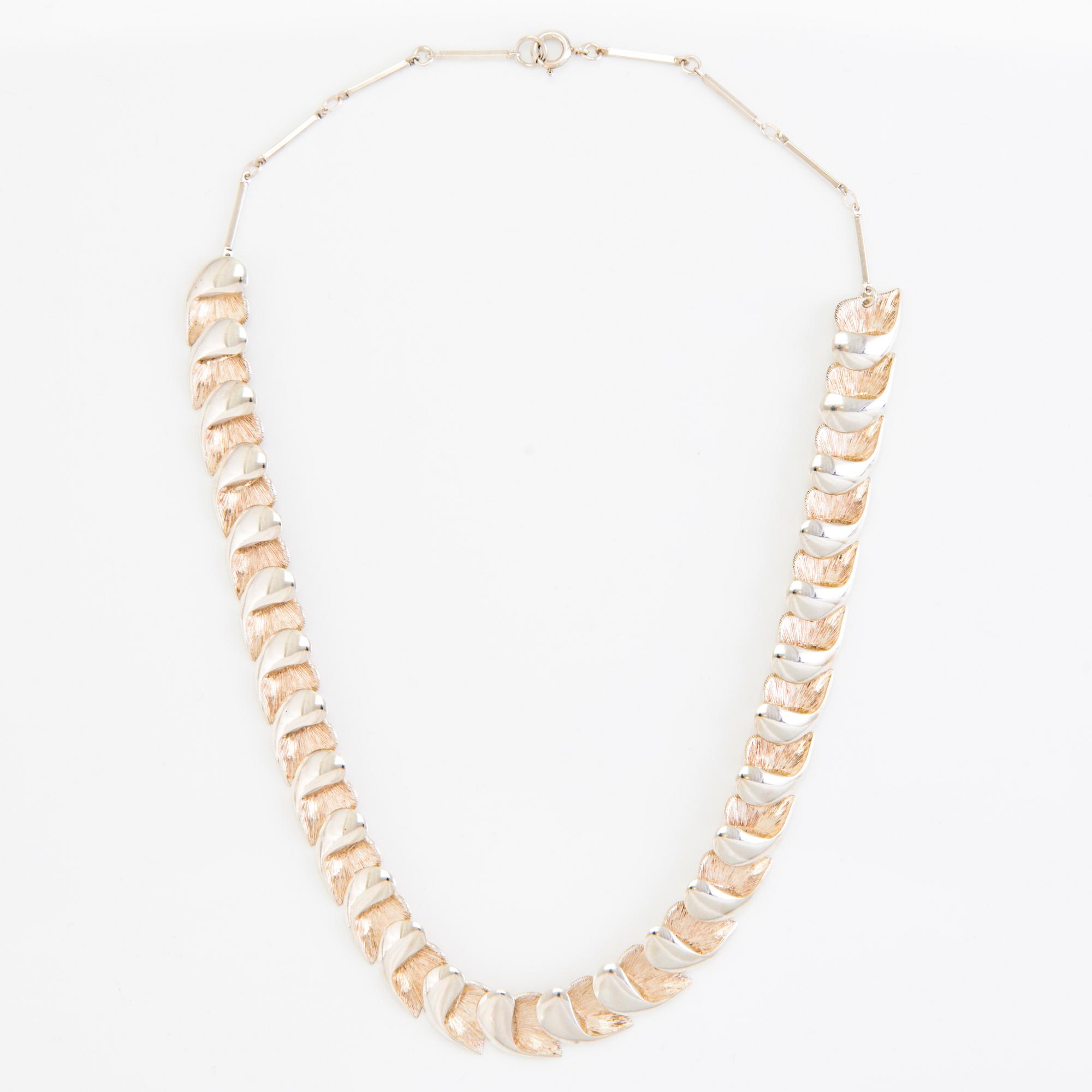 A set of sterling silver necklace and bracelet. Valo-koru, Turku.