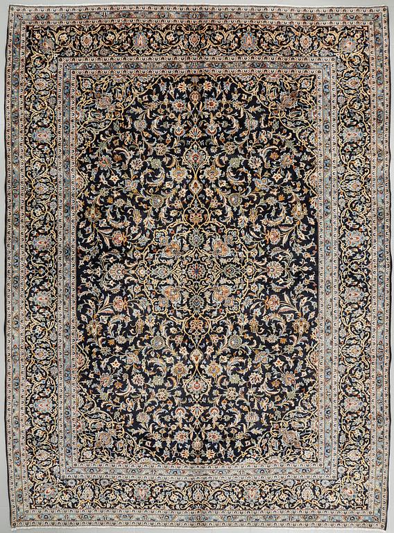 A Keshan rug, 410 x 300 cm.